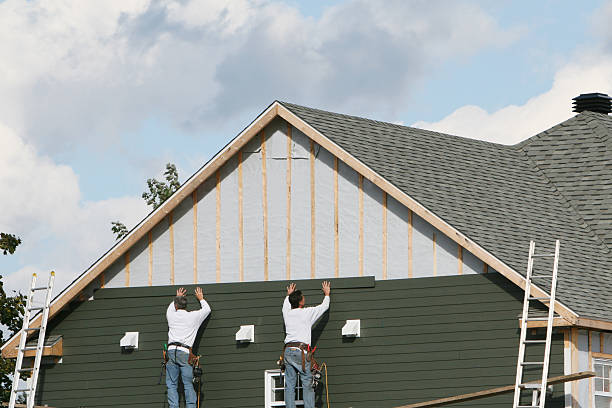 Professional Siding technician working in Bloxom, VA